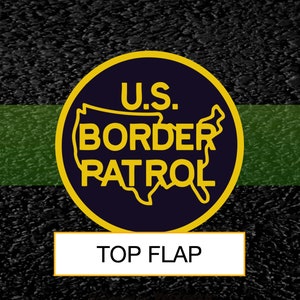 May include: A yellow and blue U.S. Border Patrol patch with a map of the United States inside. The text "U.S. BORDER PATROL" is written in a gold outline around the map. The patch is on a black background with a green stripe above it. The text "TOP FLAP" is written in a white rectangle below the patch.