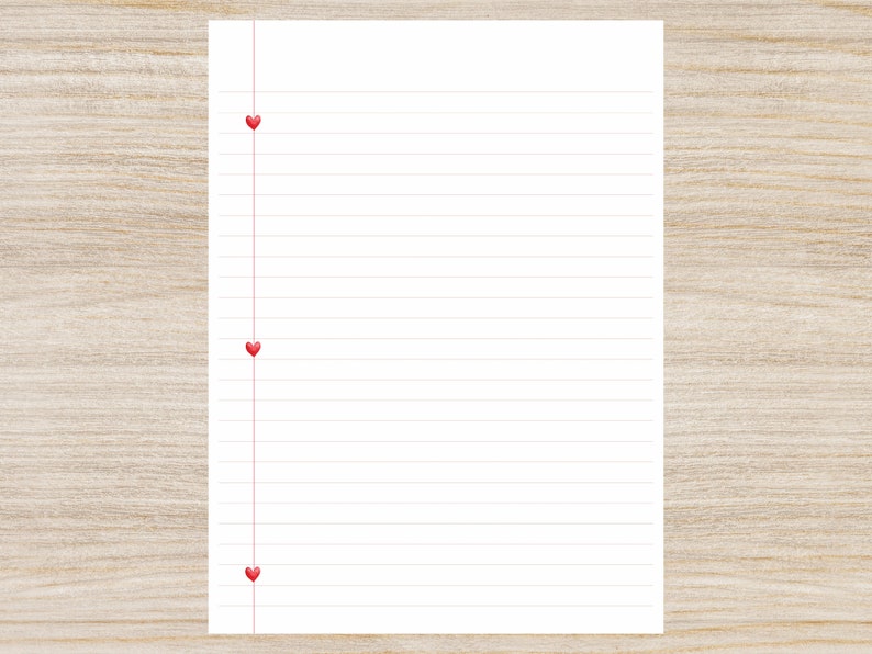 May include: A white sheet of lined paper with three red hearts along the left edge.
