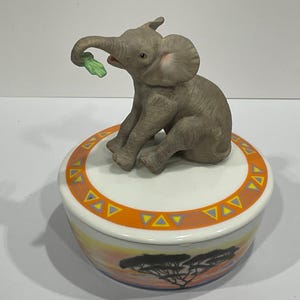 Lenox Baby Elephant Music Box, Porcelain Bowl with Elephant Topper , Elephant with Uplifted Lucky Truck