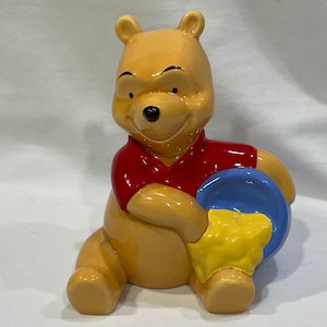 Winnie the Pooh and the Honey Pot, The Walt Disney Company, Winnie the Pooh Holding Honey Pot. Winnie the Pooh figure