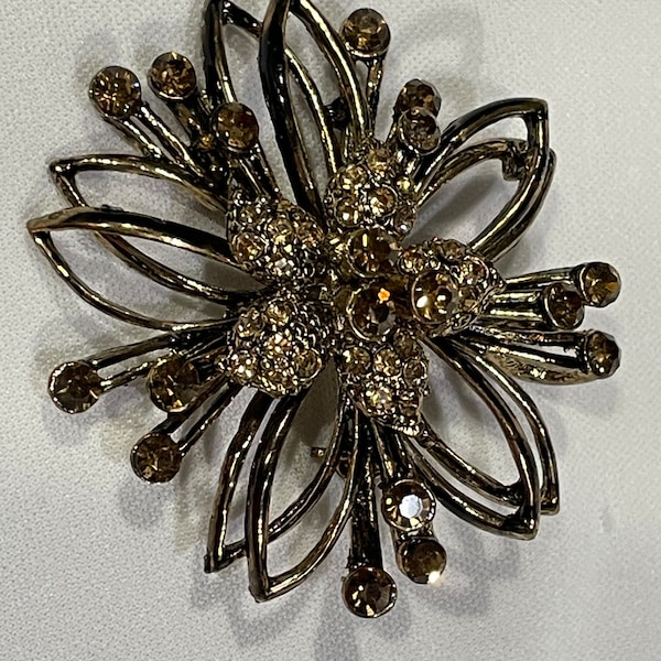 Bronze Tone Atomic Brooch with Amber Colored Rhinestones