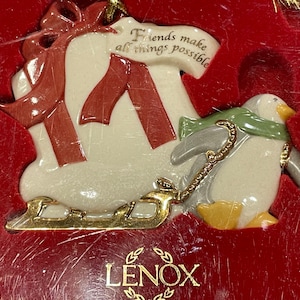 Lenox Ivory Porcelain, Friends Make Things Possible Ornament, Penguin with a Present on a Sled  Christmas Ornament, Ornament in Box