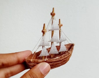 miniature ship boat sailing ship sailing boat miniature natural dollhouse tiny little sailing boat beach