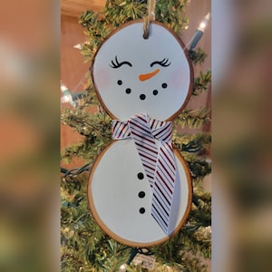 Snowman wooden ornament, candy cane scarf