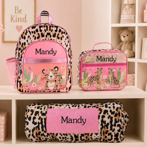 Personalized leopard preschool backpack set with matching insulated lunch box and nap mat, customized with child's name for daycare and preschool.