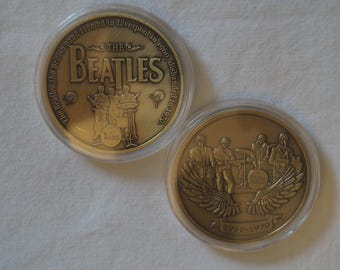 The Beatles - 1960-1970 - 1 oz. Bronze Plated Coin in Case.