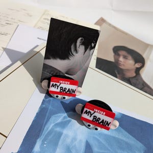 RM carte photo perdue pour voyageur debout | BTS