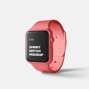 Puede incluir: Un reloj inteligente rosa con una pantalla negra que dice "SMART WATCH MOCKUP".