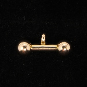 Vintage 1960-tals massivt 9 karat guld Puffy T Bar Dumb Bell-hänge berlock