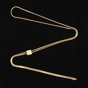 Collar tipo lariat ajustable de oro macizo de 9 quilates (9k) con eslabones en forma de S, vintage de 1981, con sello distintivo. 29 pulgadas.