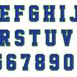 May include: A blue and green alphabet and number font with a bold, blocky style. The letters and numbers are outlined in green and filled in with blue.