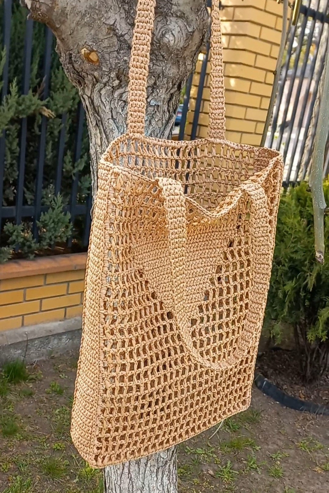 woven raffia shoulder