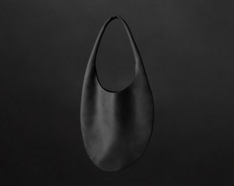 Asymmetric Round Leather Hobo Bag Calliope with Crossbody Handle