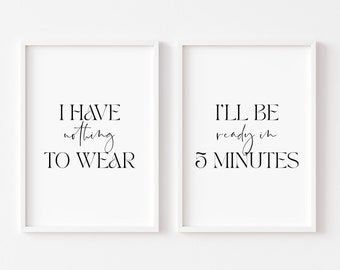 May include: Two white framed prints with black text. The left print says "I have nothing to wear". The right print says "I'll be ready in 5 minutes".