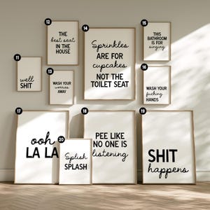 May include: A collection of framed wall art with humorous phrases in black script on white backgrounds. The phrases include "well SHIT," "the best seat in the house," "wash your worries away," and "Sprinkles are for cupcakes NOT THE TOILET SEAT."