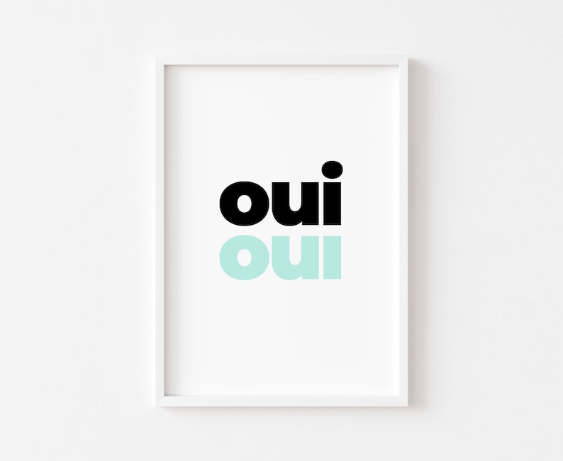 May include: A white framed print with the word "oui" in black and a lighter blue color.