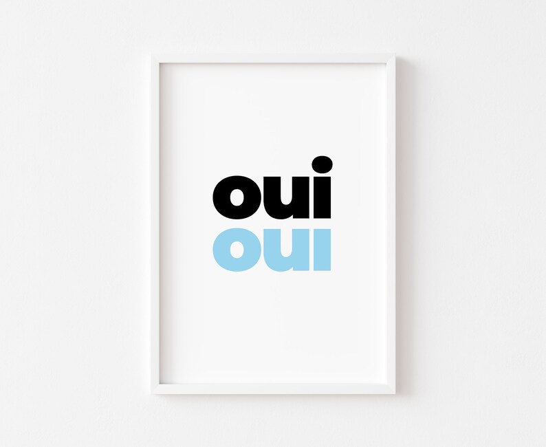 May include: A white framed print with the word "oui" in black and light blue. The word "oui" is repeated twice, once in black and once in light blue.