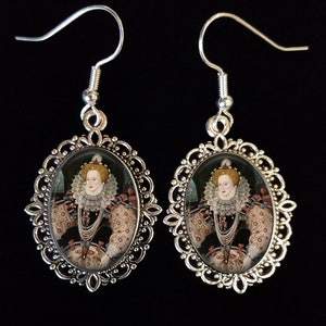 May include: Silver earrings with a cameo of Queen Elizabeth I in an oval frame. The cameo is set in a silver filigree frame.