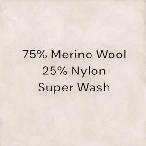 May include: A fabric swatch with the text "75% Merino Wool 25% Nylon Super Wash" printed on it.