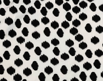 Black polka dot ITY Fabric, black edgy spot on white knit, very soft opaque drapey fabric, dress fabric, polyester city, irregular dot print