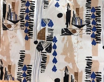 May include: Abstract fabric with a white background and a repeating pattern of black, brown, and blue geometric shapes. The pattern includes lines, circles, and abstract shapes.