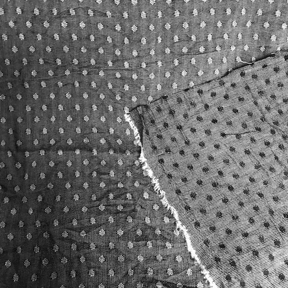 French Viscose yarn dye, reversible crushed fabric, grey jacquard spot, opaque. medium weight fabric, softly crinkled woven poly cotton