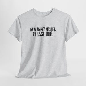 Nuevo Nido Vacío - POR FAVOR, ABRAZA. Camiseta unisex de algodón grueso.