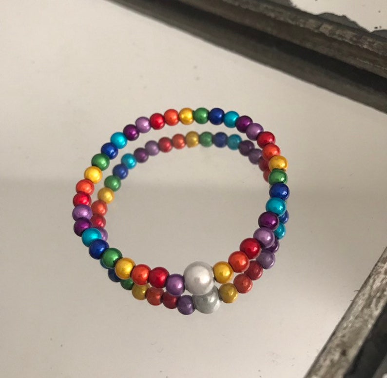 Childrens wear it with pride miracleglow bead rainbow necklace and bracelet set.