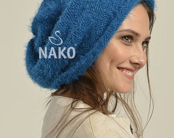 May include: A blue fuzzy knit beanie with the text "NAKO" on the side.