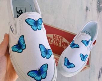 white slip on vans with butterflies