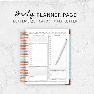 May include: A white daily planner page with a copper spiral binding. The page is divided into sections for top priorities, to do, schedule, health, calls, emails, texts, wake time, and in bed. The page also includes a calendar for the year.