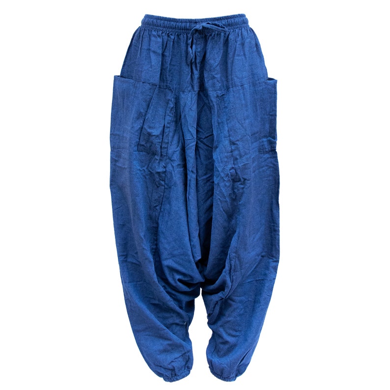 May include: Blue cotton pants with a drawstring waist and large pockets on the sides.