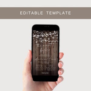 May include: A smartphone displaying a wedding rehearsal dinner invitation. The invitation features the text "the night before" in elegant script, with string lights and a wooden background. Details include the couple's names, date, time, and locations.