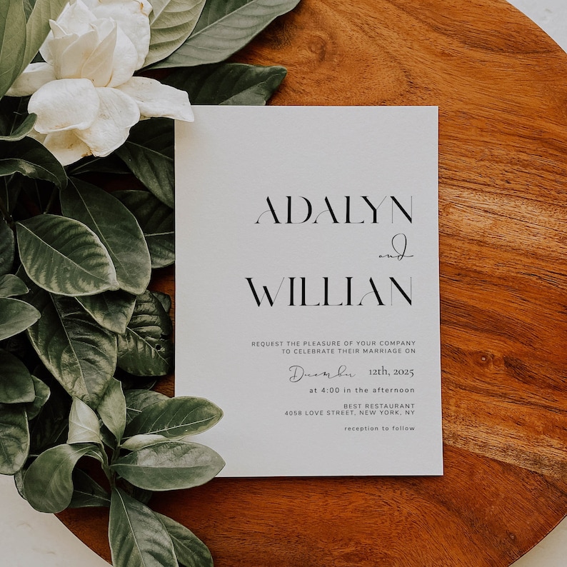May include: A white wedding invitation with black text. The invitation reads "Adalyn and Willian request the pleasure of your company to celebrate their marriage on December 12th, 2025 at 4:00 in the afternoon at Best Restaurant, 4058 Love Street, New York, NY. Reception to follow."