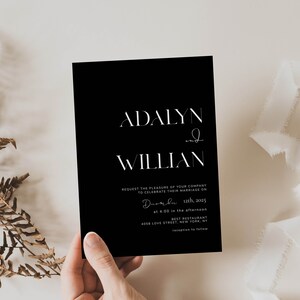 May include: Black wedding invitation with white text. The invitation reads "Adalyn & Willian Request the pleasure of your company to celebrate their marriage on December 12th, 2025 at 4:00 in the afternoon Best Restaurant 4058 Love Street, New York, NY"