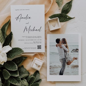 May include: A wedding invitation with a white background and black text. The invitation reads "Amelia and Michael request the pleasure of your company to celebrate their marriage on Saturday, 15th October 2025, 4:00 PM Best Restaurant 4058 Love Street, New York, NY. Please scan this QR code to RSVP and for all the details."