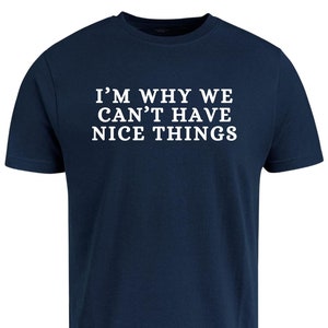 May include: A navy blue t-shirt with white text that reads "I'm why we can't have nice things."