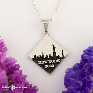 City skyline necklace laser engraved with city outline of your choice - travel inspired jewelry - personalized jewelry