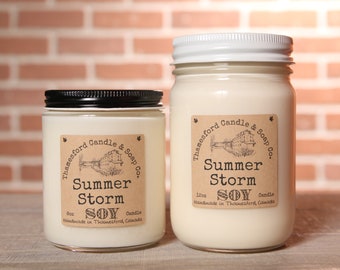 Summer Storm Scented Candle - Captures the mystery of a storm. Bergamot, green leaves, and lemon, muguet, amber, and tonka
