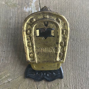 Antique c1910s M. Myers & Son “Good Luck” Black Brass Tone Horseshoe Shaped Paper Clip Desk Clip Letter Holder Made in England Advertising