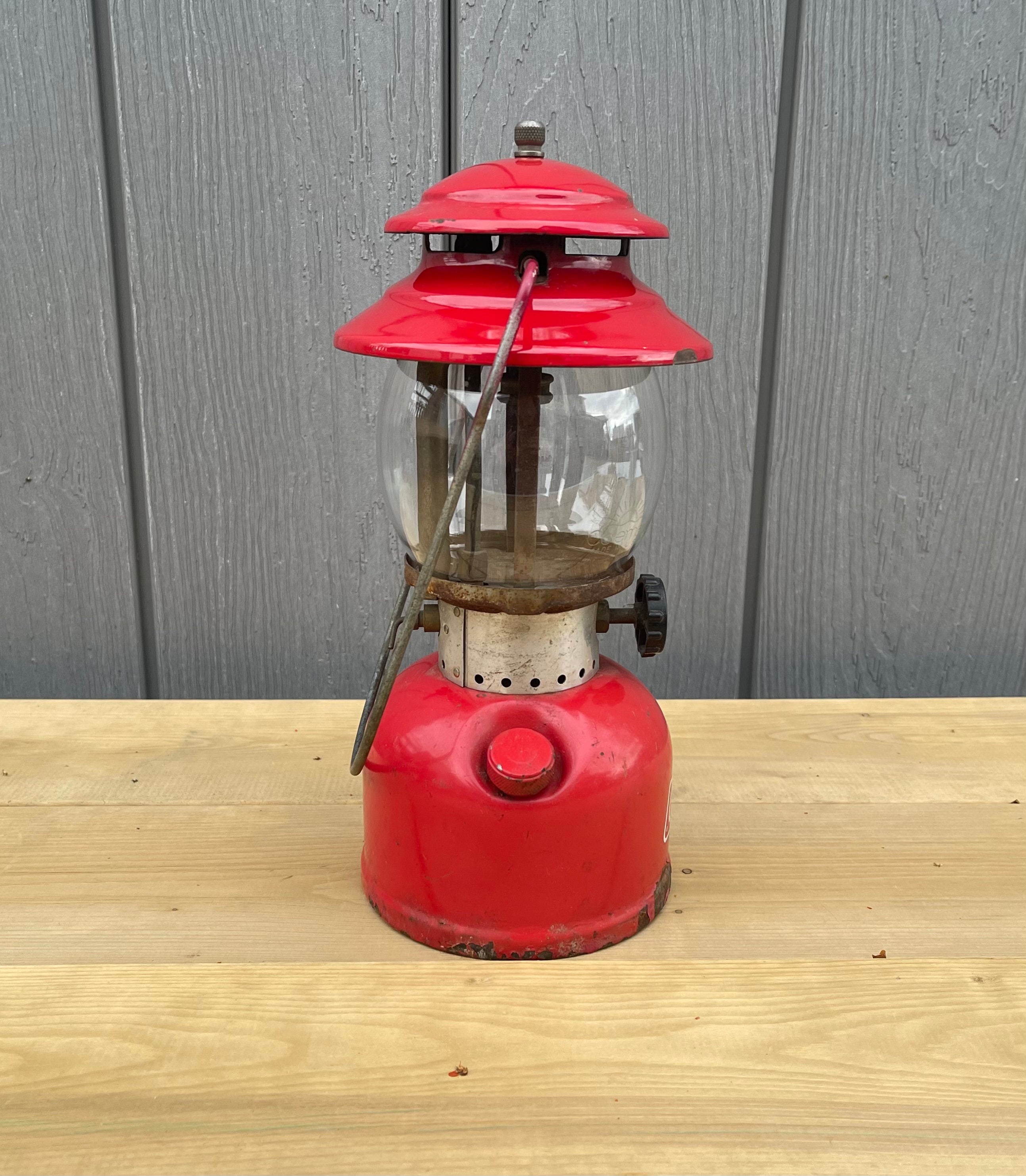 Sold at Auction: COLEMAN 200A HIKING CAMPING LANTERN