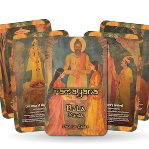 May include: A set of oracle cards with illustrations of Hindu deities and scenes from the Ramayana. The cards are in a vintage style with gold accents and the title "Ramayana Bala Kanda Oracle Cards" is printed on the front.