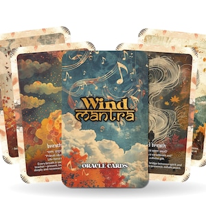 May include: A deck of "Wind Mantra" oracle cards. The cards feature colorful illustrations of clouds, autumn foliage, and musical notes. The text "Wind Mantra" and "Oracle Cards" are visible on the front of the deck.