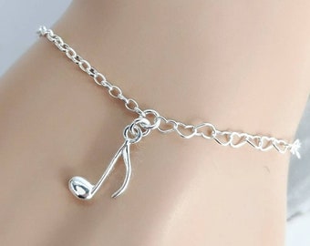 Silvertone Rounded Eighth Music Note & Beyond Infinity Toggle Chain Bracelet 8 Silvertone Rounded Eighth Music Note & Beyond Infinity Toggle Chain Bracelet 8