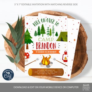 May include: A 5x7 inch printable invitation for a camping themed birthday party. The invitation features a watercolor illustration of a campfire, tent, and trees. The text reads "HIKE ON OVER TO CAMP BRANDON TO CELEBRATE HIS 7TH BIRTHDAY!" and includes details for the party, including the date, location, and RSVP information.