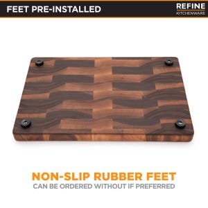 a wooden cutting board with rubber feet, which are non-slip and can be ordered without if preferred.