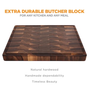 a wooden cutting board with a textured surface, designed for use in the kitchen.