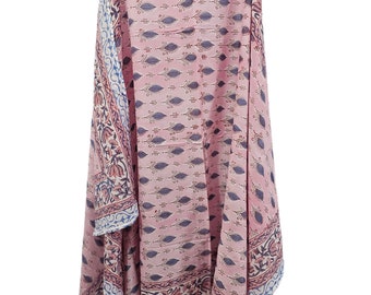 May include: A pink and blue cotton fabric with a floral print. The fabric is folded in half and has a white border.