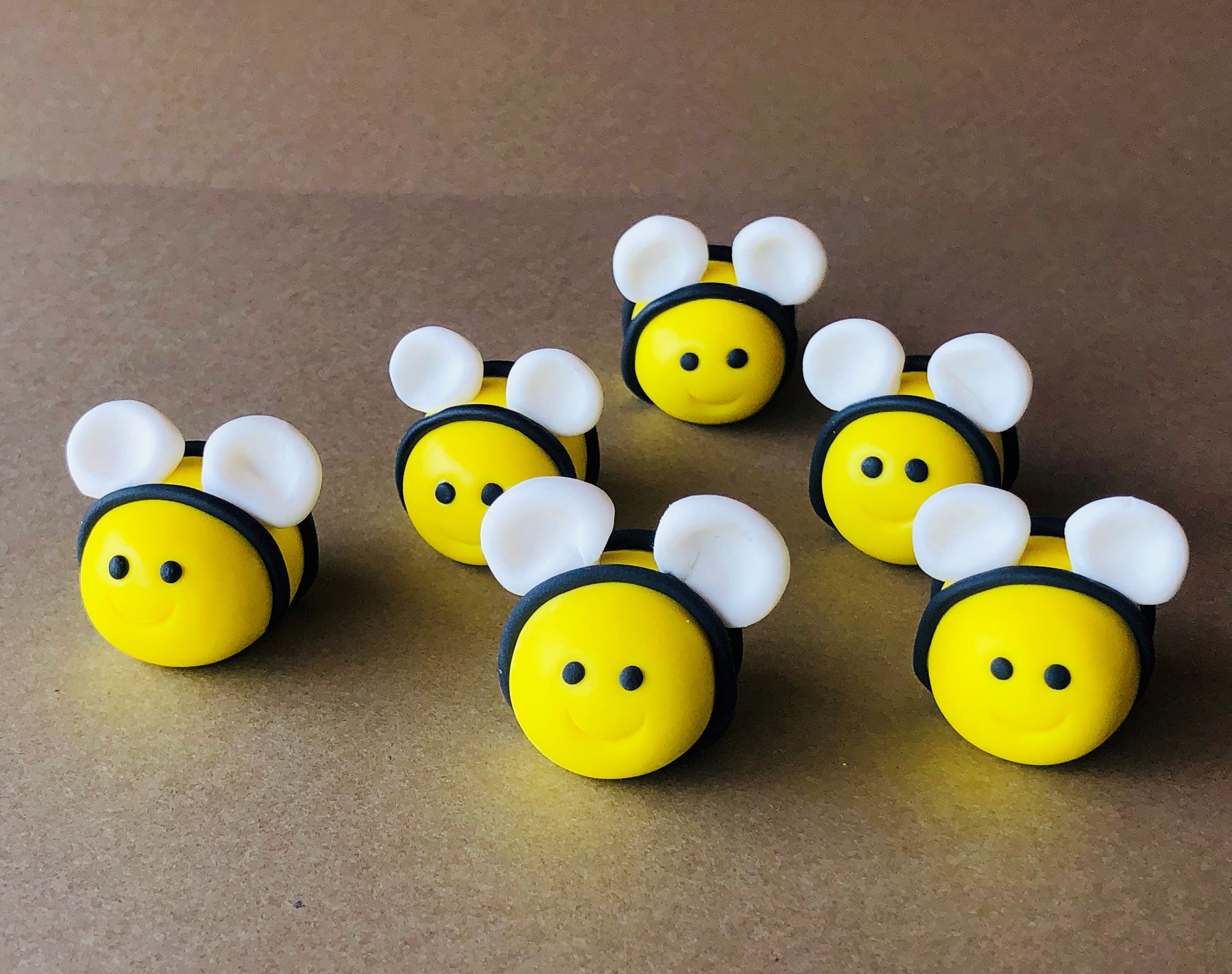 Shop Bumble Bee Sugar Toppers, Edible Bee Cupcake + Cake Toppers – Sprinkle  Bee Sweet