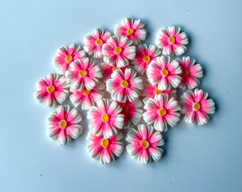 Edible sugar small flowers decorations for cakes or cupcakes